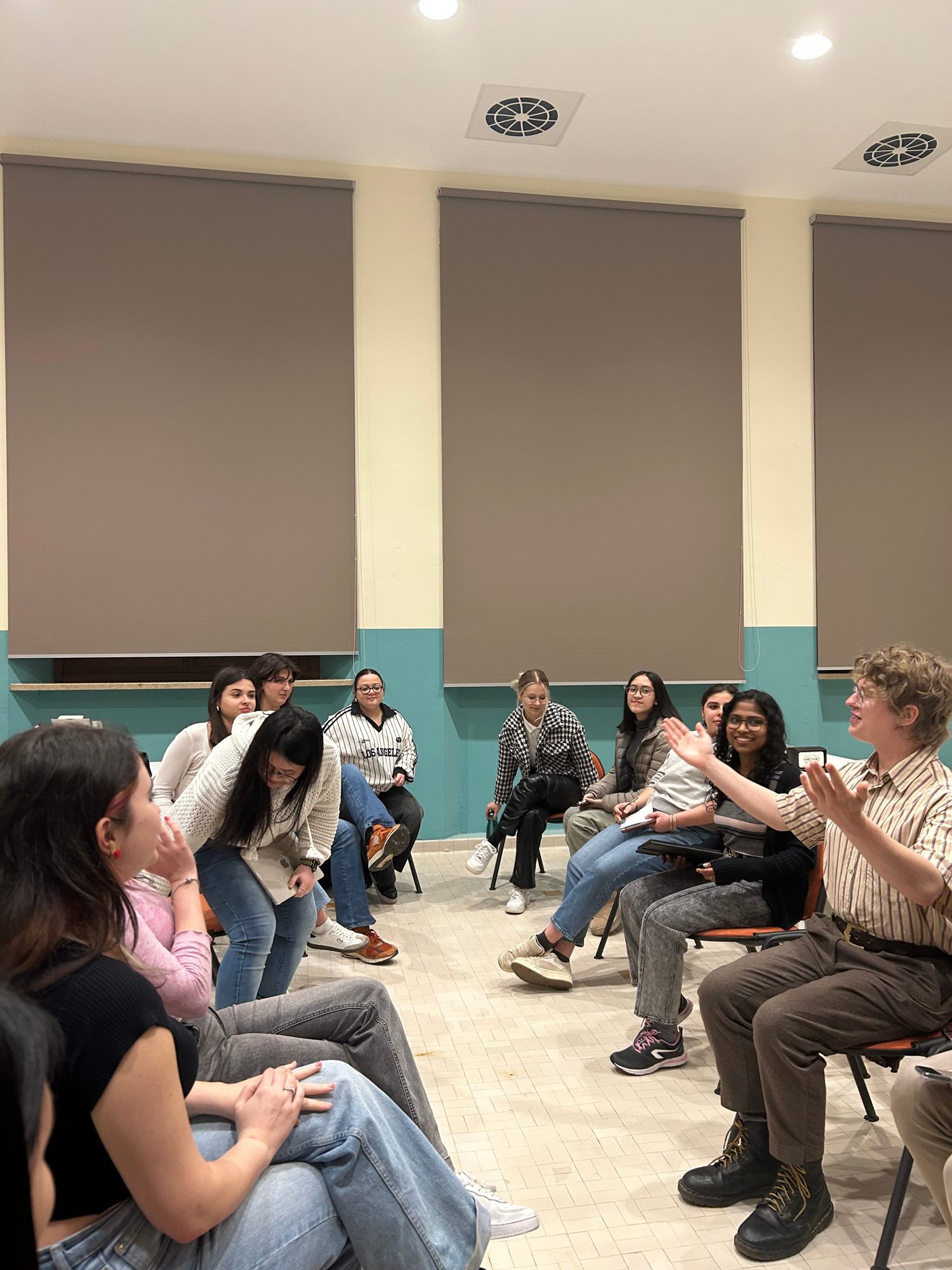 MUN Club members raising their hands