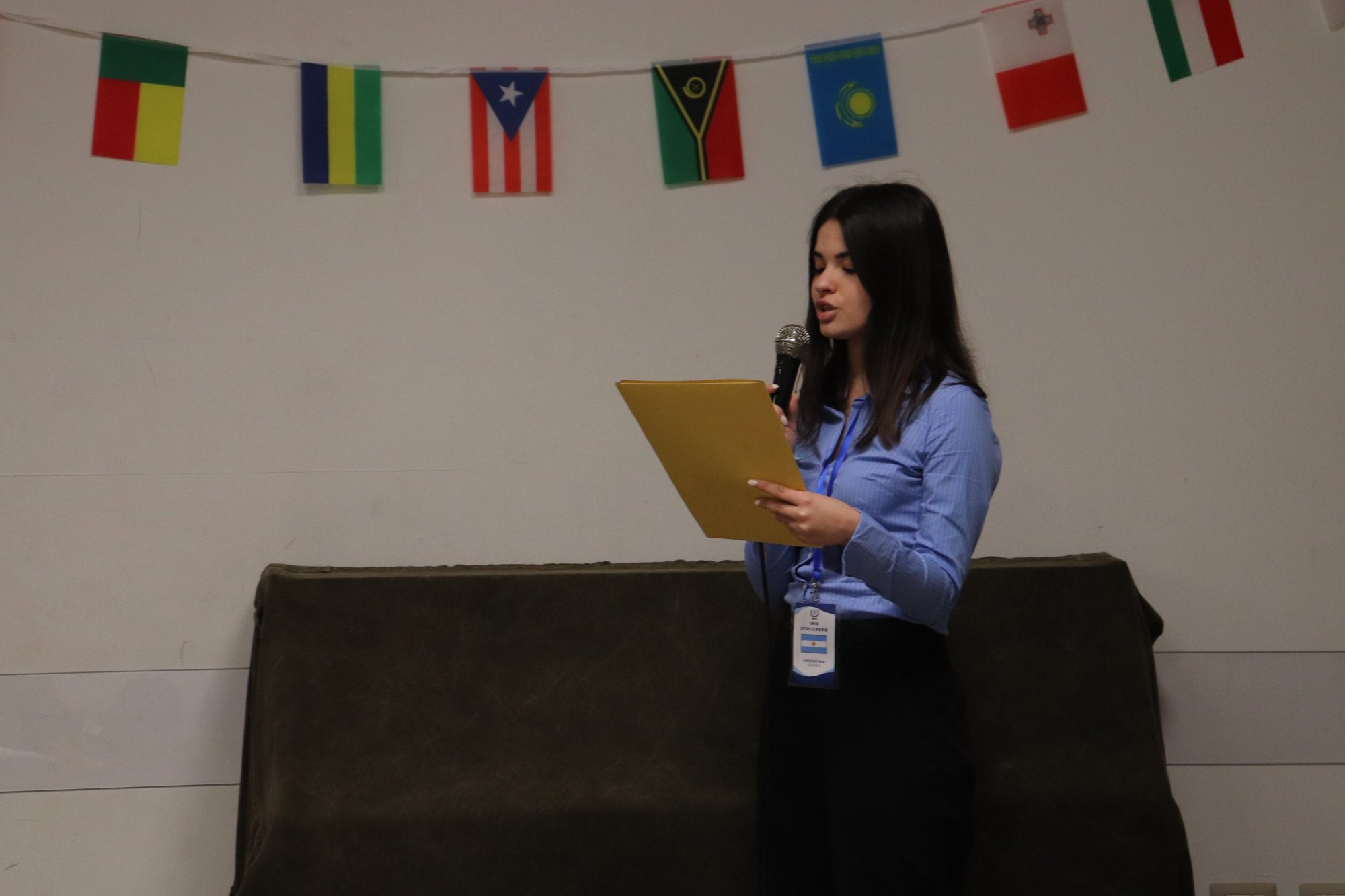 A student speaking at the podium